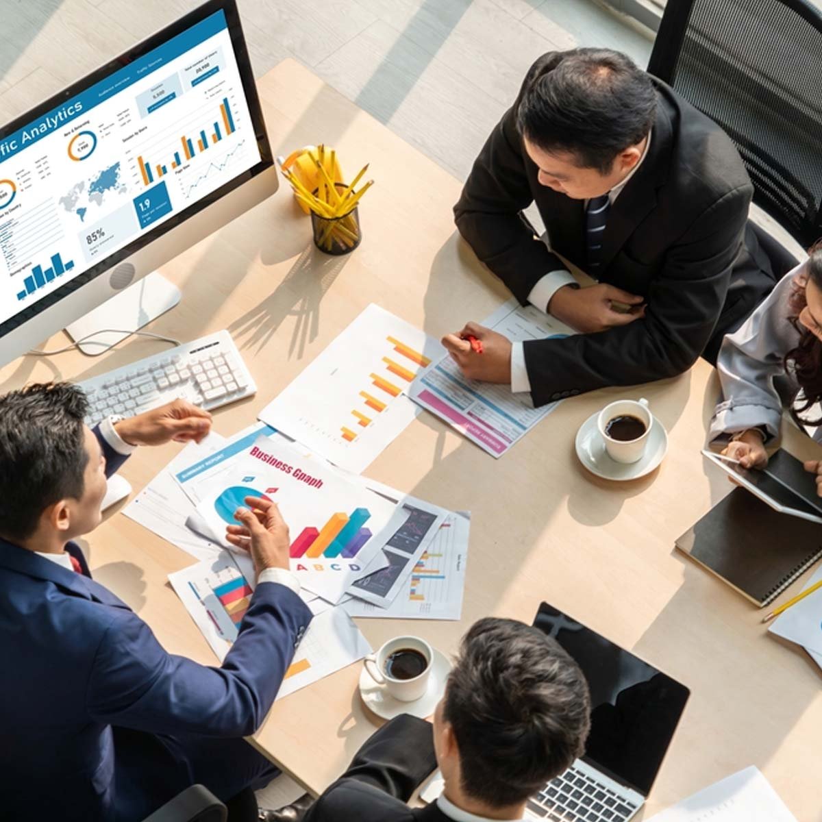 Business meeting with data presentations.